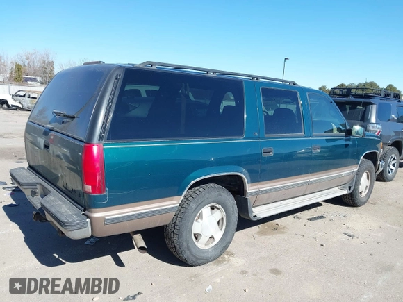1997 Chevrolet Suburban with VIN 3GNFK16R9VG184722, listed as a IAAI auction lot 41662635 with 176,652 mi miles. Bid and sale history available at carsss.com. Image 4.
