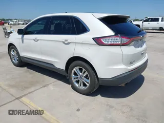 2015 Ford Edge SEL with VIN 2FMTK3J97FBC16209, listed as a IAAI auction lot 41974393 with 129,608 mi miles. Bid and sale history available at carsss.com. Image 3.