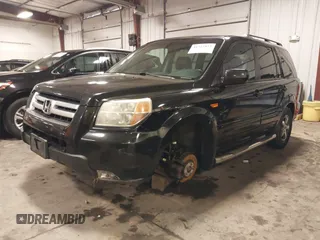 2007 Honda Pilot EX-L with VIN 5FNYF18677B017230, listed as a IAAI auction lot 41727853 with 257,527 mi miles and . Bid and sale history available at DreamBid. Image 2.