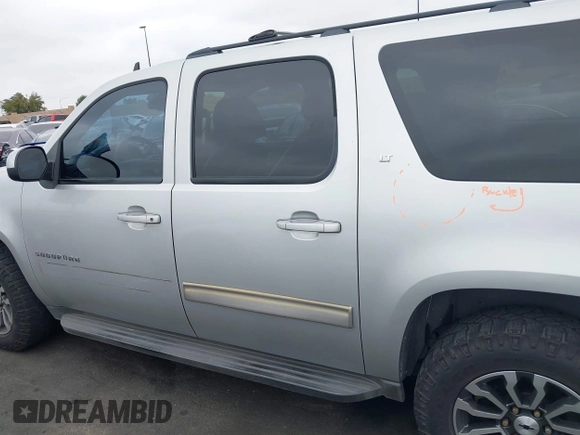 2010 Chevrolet Suburban LT with VIN 1GNUCJE03AR238548, listed as a IAAI auction lot 42104596 with 153,959 mi miles and . Bid and sale history available at DreamBid. Image 14.