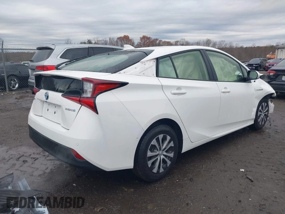 2022 Toyota Prius L Eco with VIN JTDKAMFU3N3188445, listed as a IAAI auction lot 41138076 with 25,225 mi miles and . Bid and sale history available at DreamBid. Image 4.