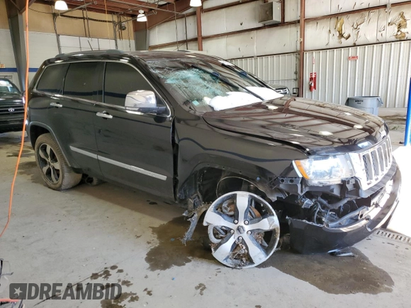 2013 Jeep Grand Cherokee Overland with VIN 1C4RJFCT5DC640710, listed as a Copart auction lot 41474875 with 223,668 mi miles and Clean Title. Bid and sale history available at carsss.com. Image 4.