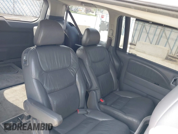 2005 Honda Odyssey EX-L with VIN 5FNRL38755B014826, listed as a IAAI auction lot 42147100 with 145,484 mi miles. Bid and sale history available at carsss.com. Image 8.