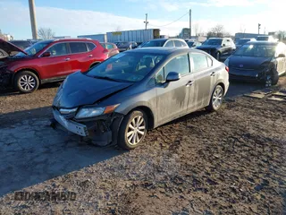 2012 Honda Civic EX-L with VIN 2HGFB2F9XCH587038, listed as a IAAI auction lot 41337259 with 114,520 mi miles and . Bid and sale history available at DreamBid. Image 18.