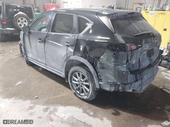 2022 Mazda CX-5 2.5 S Carbon Edition with VIN JM3KFBCM0N0585744, listed as a IAAI auction lot 41548494 with NaN miles. Bid and sale history available at carsss.com. Image 3.