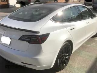 2021 Tesla Model 3 Standard Range Plus with VIN 5YJ3E1EA2MF854372, listed as a Copart auction lot 56435825 with 44,637 mi miles and Salvage Title. Bid and sale history available at DreamBid. Image 4.