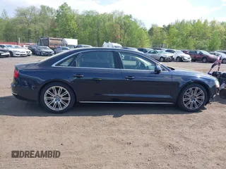 2014 Audi A8 3.0T z VIN WAURGAFD7EN005979, wystawiony jako IAAI lot #42169900 z przebiegiem 126 523 mil mil oraz . Historia ofert i sprzedaży dostępna na DreamBid. Obrazek 13.