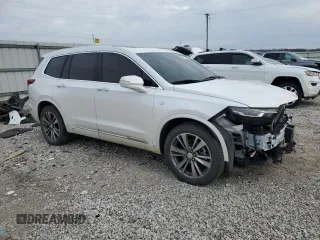 2021 Cadillac XT6 Premium Luxury z VIN 1GYKPCRS0MZ116319, wystawiony jako Copart lot #44315055 z przebiegiem 61 105 mil mil oraz Szkoda całkowita • Salvage title. Historia ofert i sprzedaży dostępna na DreamBid. Obrazek 4.