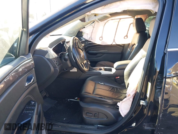 2015 Cadillac SRX z VIN 3GYFNAE32FS543933, wystawiony jako IAAI lot #41578338 z przebiegiem 150 937 mil mil oraz . Historia ofert i sprzedaży dostępna na DreamBid. Obrazek 5.