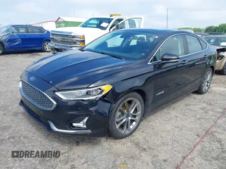 2019 Ford Fusion Titanium z VIN 3FA6P0RU7KR194482, wystawiony jako IAAI lot #42176110 z przebiegiem 80 771 mil mil oraz . Historia ofert i sprzedaży dostępna na DreamBid. Obrazek 2.