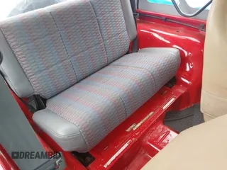 1999 Jeep Wrangler SE z VIN 1J4FY29P5XP487111, wystawiony jako IAAI lot #42125867 z przebiegiem 156 804 mil mil oraz . Historia ofert i sprzedaży dostępna na DreamBid. Obrazek 8.