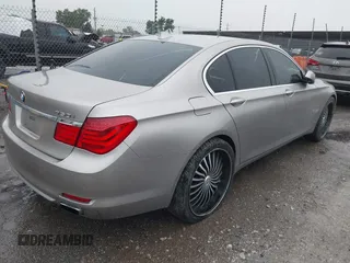 2012 BMW 7 Series 750i with VIN WBAKA8C50CDX01319, listed as a IAAI auction lot 42133359 with 168,986 mi miles and . Bid and sale history available at DreamBid. Image 4.