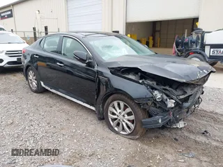 2014 Kia Optima EX z VIN 5XXGN4A77EG330968, wystawiony jako IAAI lot #42209541 z przebiegiem 106 888 mil mil oraz . Historia ofert i sprzedaży dostępna na DreamBid. Obrazek 1.