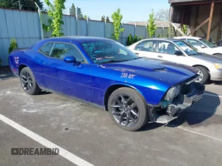 2019 Dodge Challenger SXT z VIN 2C3CDZAG0KH530232, wystawiony jako IAAI lot #42101045 z przebiegiem 57 693 mil mil oraz . Historia ofert i sprzedaży dostępna na DreamBid. Obrazek 1.