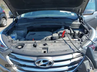 2017 Hyundai Santa Fe 2.4L z VIN 5NMZUDLB7HH015347, wystawiony jako IAAI lot #42035606 z przebiegiem 118 305 mil mil oraz . Historia ofert i sprzedaży dostępna na DreamBid. Obrazek 10.