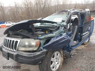 2002 Jeep Grand Cherokee Laredo with VIN 1J4GW48S82C321712, listed as a IAAI auction lot 41855809 with 1 mi miles. Bid and sale history available at carsss.com. Image 6.