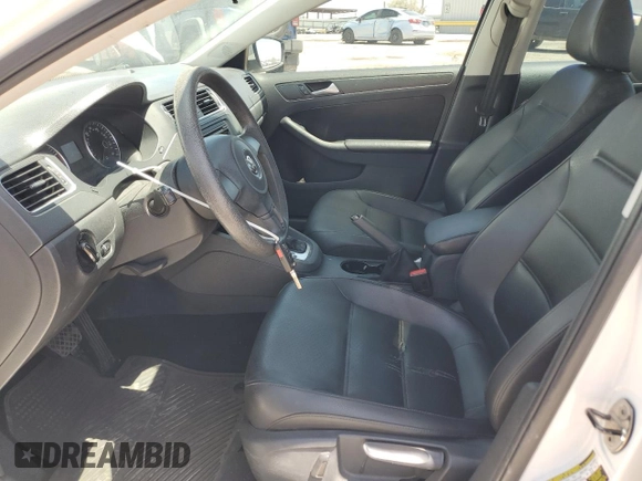 2014 Volkswagen Jetta SE with VIN 3VWD17AJ0EM267333, listed as a Copart auction lot 57684255 with 130,141 mi miles and Salvage title. Bid and sale history available at DreamBid. Image 7.
