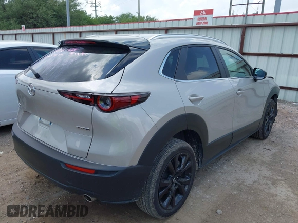 2024 Mazda CX-30 2.5 S Select Sport with VIN 3MVDMBBM6RM694560, listed as a IAAI auction lot 42172660 with 20,608 mi miles. Bid and sale history available at carsss.com. Image 4.