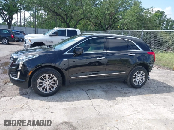 2017 Cadillac XT5 FWD with VIN 1GYKNARS6HZ123114, listed as a IAAI auction lot 41933928 with 166,213 mi miles. Bid and sale history available at carsss.com. Image 14.