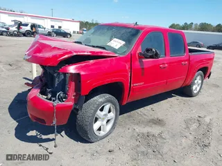 2007 Chevrolet Silverado 1500 LTZ with VIN 2GCFK13Y671561457, listed as a IAAI auction lot 40829294 with 168,186 mi miles. Bid and sale history available at carsss.com. Image 2.