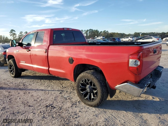 2014 Toyota Tundra 4WD Truck SR with VIN 5TFCY5F1XEX017048, listed as a Copart auction lot 82190834 with 302,685 mi miles and Salvage Title. Bid and sale history available at carsss.com. Image 2.