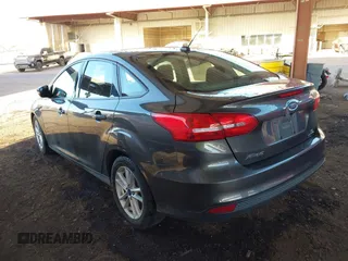 2016 Ford Focus SE with VIN 1FADP3F28GL330815, listed as a IAAI auction lot 41696821 with 125,247 mi miles. Bid and sale history available at carsss.com. Image 3.