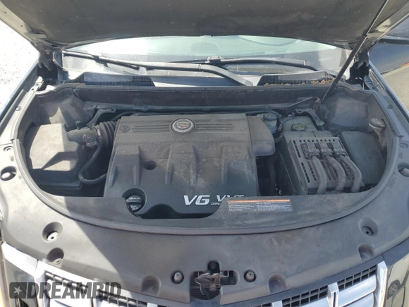 2013 Cadillac SRX Performance Collection z VIN 3GYFNHE37DS609463, wystawiony jako Copart lot #54606255 z przebiegiem 180 059 mil mil oraz Szkoda całkowita • Salvage title. Historia ofert i sprzedaży dostępna na DreamBid. Obrazek 12.