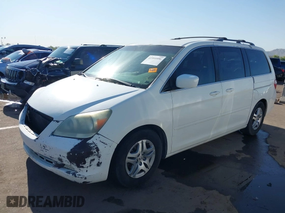 2005 Honda Odyssey EX with VIN 5FNRL38465B081716, listed as a IAAI auction lot 41998956 with 173,182 mi miles and . Bid and sale history available at carsss.com. Image 18.