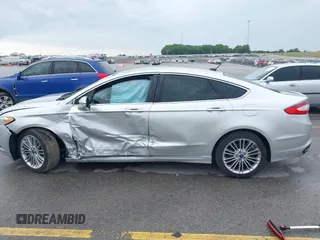 2013 Ford Fusion SE with VIN 3FA6P0H98DR253944, listed as a IAAI auction lot 42525128 with 104,081 mi miles and . Bid and sale history available at DreamBid. Image 14.