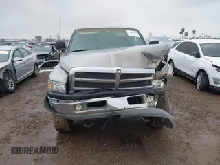 2000 Dodge Ram 2500 with VIN 1B7KF23W0YJ126951, listed as a IAAI auction lot 41802970 with 179,644 mi miles. Bid and sale history available at carsss.com. Image 12.