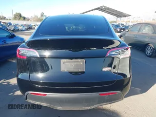 2024 Tesla Model Y Long Range with VIN 7SAYGDEEXRA216186, listed as a IAAI auction lot 41106653 with 25,331 mi miles and . Bid and sale history available at DreamBid. Image 16.