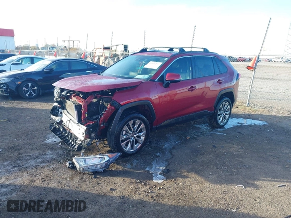 2021 Toyota RAV4 XLE Premium with VIN 2T3C1RFV1MW145048, listed as a IAAI auction lot 41018272 with 61,959 mi miles and . Bid and sale history available at DreamBid. Image 2.