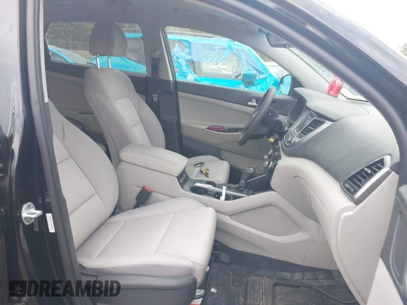 2018 Hyundai Tucson SE z VIN KM8J2CA47JU820390, wystawiony jako IAAI lot #42104349 z przebiegiem 11 725 mil mil oraz . Historia ofert i sprzedaży dostępna na DreamBid. Obrazek 5.