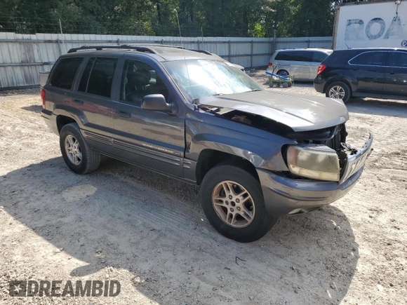 2002 Jeep Grand Cherokee with VIN 1J8GX48S12C255290, listed as a Copart auction lot 57832025 with 191,293 mi miles and Non repairable. Bid and sale history available at DreamBid. Image 4.