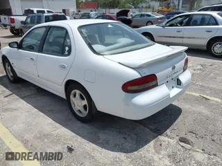 1997 Nissan Altima XE with VIN 1N4BU31DXVC258666, listed as a IAAI auction lot 42075795 with 122,199 mi miles. Bid and sale history available at carsss.com. Image 3.
