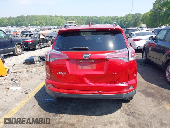2016 Toyota RAV4 LE with VIN JTMZFREV1GJ098247, listed as a IAAI auction lot 42065800 with 199,172 mi miles and . Bid and sale history available at DreamBid. Image 16.