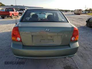 2005 Hyundai Accent GLS with VIN KMHCG45C35U595666, listed as a Copart auction lot 88294365 with 70,497 mi miles and Salvage Title. Bid and sale history available at carsss.com. Image 6.