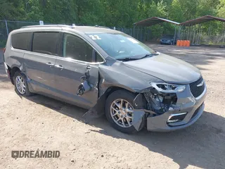 2022 Chrysler Pacifica Touring L z VIN 2C4RC1BG3NR168565, wystawiony jako IAAI lot #42150290 z przebiegiem 61 750 mil mil oraz . Historia ofert i sprzedaży dostępna na DreamBid. Obrazek 1.