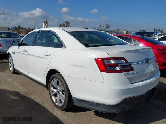 2015 Ford Taurus Limited with VIN 1FAHP2F80FG144421, listed as a IAAI auction lot 41947787 with 143,496 mi miles. Bid and sale history available at carsss.com. Image 3.
