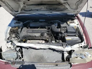 2001 Kia Sephia z VIN KNAFB121115074609, wystawiony jako Copart lot #72346144 z przebiegiem 88 400 mil mil oraz Tytuł czysty. Historia ofert i sprzedaży dostępna na DreamBid. Obrazek 11.