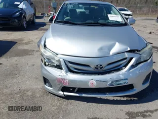 2012 Toyota Corolla L with VIN 5YFBU4EE7CP011306, listed as a IAAI auction lot 41695717 with 99,136 mi miles. Bid and sale history available at carsss.com. Image 6.