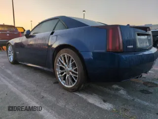 2004 Cadillac XLR z VIN 1G6YV34A945601993, wystawiony jako Copart lot #75136134 z przebiegiem Nie podano mil oraz Nie do naprawy. Historia ofert i sprzedaży dostępna na DreamBid. Obrazek 2.
