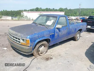 1993 Dodge Dakota S with VIN 1B7GL26X1PS140546, listed as a IAAI auction lot 42142391 with 171,634 mi miles and . Bid and sale history available at carsss.com. Image 2.
