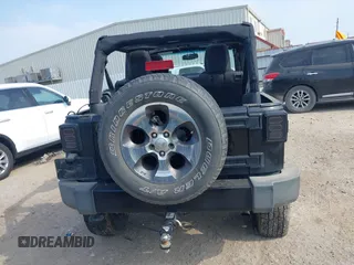 2016 Jeep Wrangler Unlimited Sahara with VIN 1C4BJWEG8GL333876, listed as a IAAI auction lot 42314351 with 163,889 mi miles and . Bid and sale history available at DreamBid. Image 16.