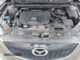 2014 Mazda CX-5 Sport z VIN JM3KE4BE6E0404753, wystawiony jako IAAI lot #42260554 z przebiegiem 144 688 mil mil oraz . Historia ofert i sprzedaży dostępna na DreamBid. Obrazek 10.