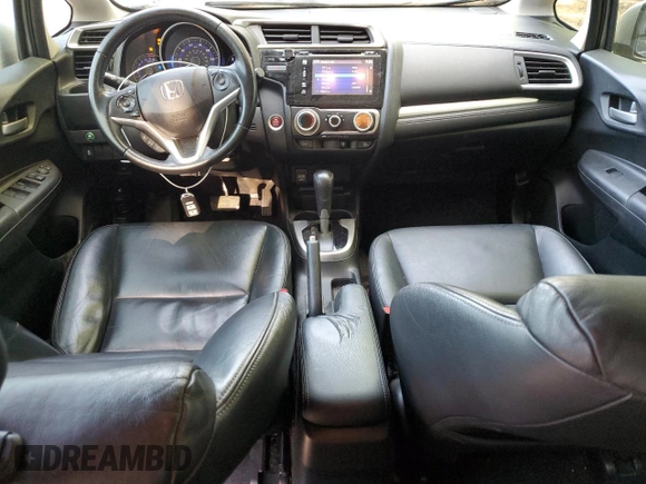 2015 Honda Fit EX-L z VIN 3HGGK5H82FM778601, wystawiony jako Copart lot #52494015 z przebiegiem 143 890 mil mil oraz Szkoda całkowita • Salvage title. Historia ofert i sprzedaży dostępna na DreamBid. Obrazek 8.