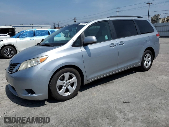 2014 Toyota Sienna LE AAS with VIN 5TDKK3DC1ES504232, listed as a Copart auction lot 54169005 with 103,724 mi miles and Salvage Title. Bid and sale history available at DreamBid. Image 1.