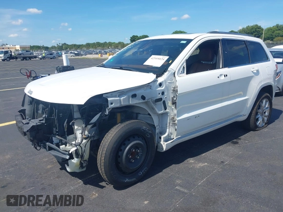 2015 Jeep Grand Cherokee Summit with VIN 1C4RJEJG5FC105038, listed as a IAAI auction lot 42555024 with 133,077 mi miles and . Bid and sale history available at DreamBid. Image 22.