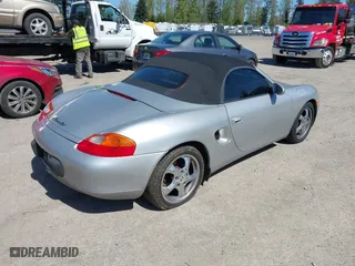 1998 Porsche Boxster with VIN WP0CA2983WU624195, listed as a IAAI auction lot 42036411 with 159,202 mi miles. Bid and sale history available at carsss.com. Image 4.
