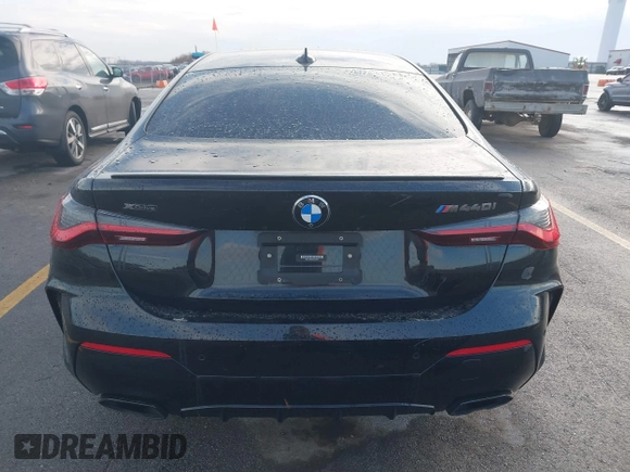 2021 BMW 4 Series M440i xDrive with VIN WBA13AR05MCG58597, listed as a IAAI auction lot 41475262 with 42,626 mi miles and . Bid and sale history available at DreamBid. Image 16.
